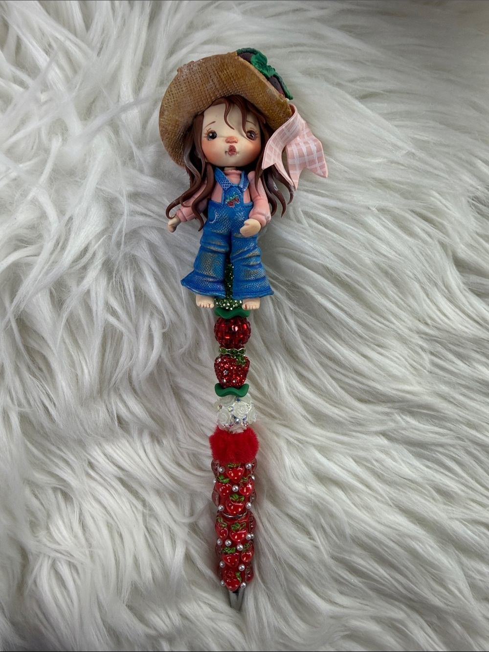Hand Crafted Brown-Hat Doll Pen with Blue Overalls and Red Bead Accents